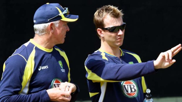 Talking strategy ... Craig McDermott with Brett Lee during Australia's tour of South Africa last year.