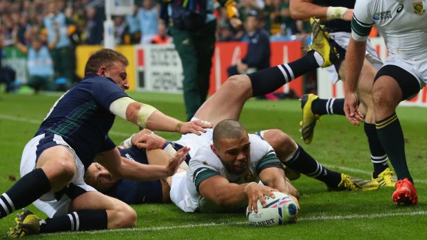 NEWCASTLE UPON TYNE, ENGLAND - OCTOBER 03:  Bryan Habana of South Africa goes over to score their third try during the 2015 Rugby World Cup Pool B match between South Africa and Scotland at St James' Park on October 3, 2015 in Newcastle upon Tyne, United Kingdom.  (Photo by Alex Livesey/Getty Images)
