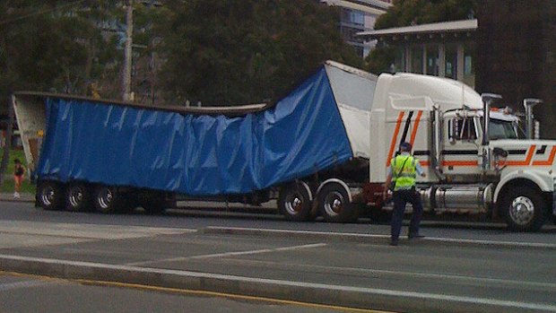 The load on the truck's trailer is pushed in at the centre.