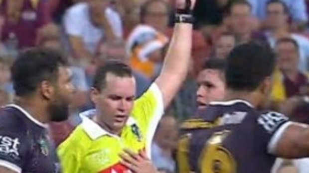 In trouble?: Brisbane's James Roberts touches referee Matt Noyen on Friday night.