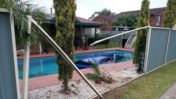 A crane is being brought in to remove the vehicle from the pool in Hinchinbrook.