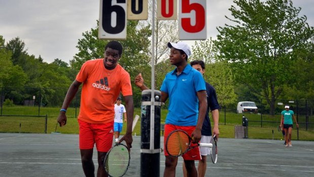 Francis, left, and Franklin Tiafoe began taking tennis lessons at 5, but it was Francis who became consumed by the sport.