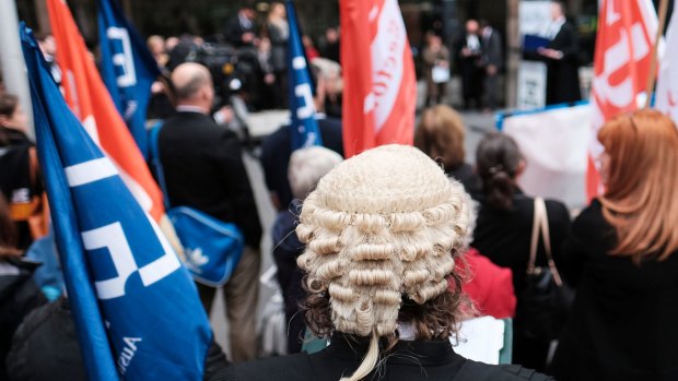 MELBOURNE, AUSTRALIA - MAY 17: Legal professionals from across the state are seen at a Rally For Legal Aid fundraiser outside the County Court of Victoria on May 17, 2016 in Melbourne, Australia. (Photo by Vince Caligiuri/Fairfax Media)
