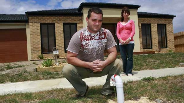 Andrew and Marina, of Brookland Greens, are unhappy about the unsightly pipes which now sprout from their nature strip.