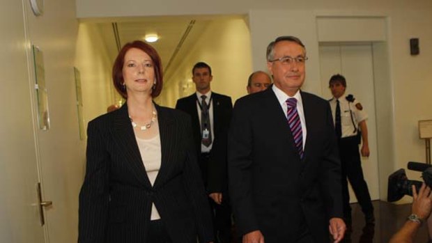 Deputy Prime Minister Julia Gillard with support from Treasurer Wayne Swan enters a leadership ballot against Prime Minister Kevin Rudd.