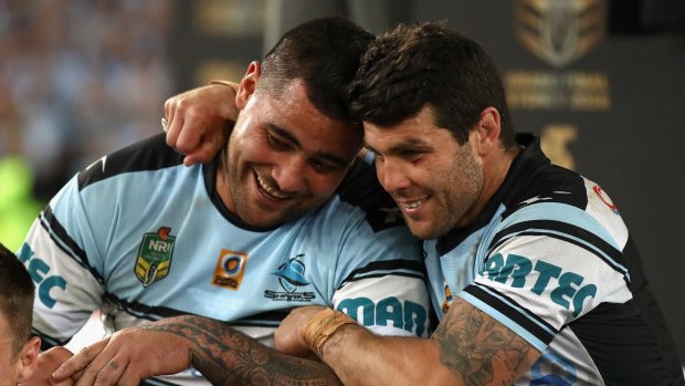 Fifita and his inspiration Michael Ennis embrace after winning the 2016 NRL grand final in October.