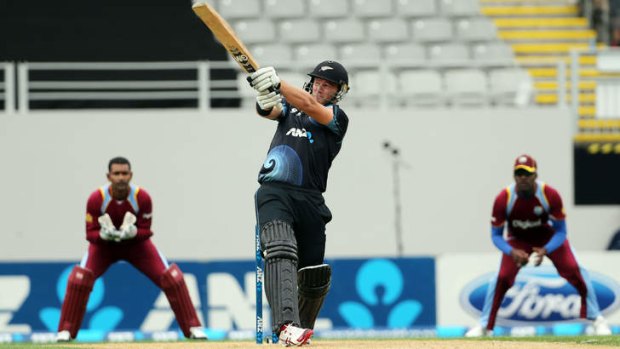 New Zealand batsman Corey Anderson smashes another delivery to the boundary against the West Indies.