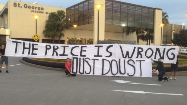 The ‘‘Oust Doust’’ banners were out again after the Dragons’ defeat to Souths.