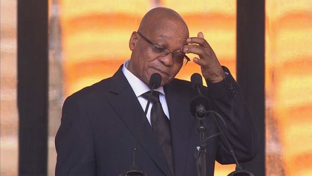 Booed: Zuma's plodding speech was a low point at the Mandela memorial in the FNB Stadium.