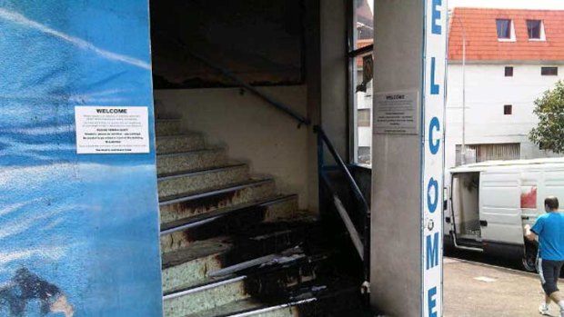 Fire damage on the stairs at the hostel.