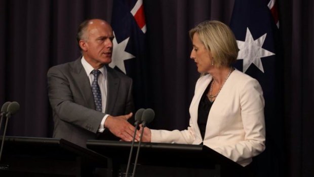 Deal: Employment Minister Eric Abetz says the Commonwealth will loan ACT Chief Minister Katy Gallagher's government $1 billion.