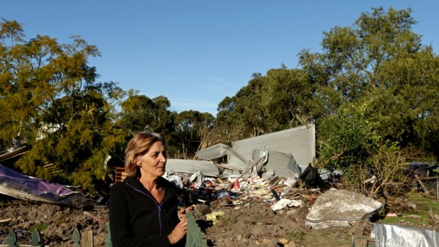 Deborah Kerr at the property after a bulldozer flattened it.
