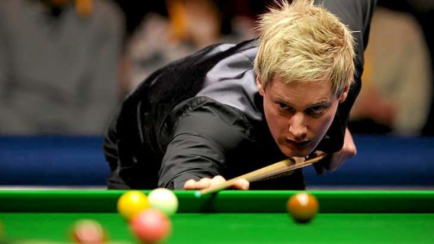 Back in the frame ... reigning champion Neil Robertson of Australia survives a first-round scare.