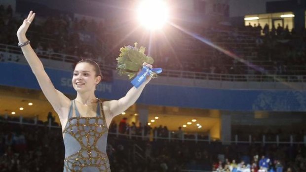Fates in the balance: Adelina Sotnikova receives the plaudits.