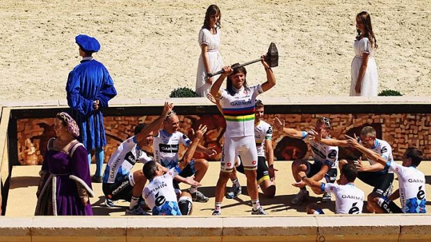 World road race champion Thor Hushovd of Norway and the Team Garmin-Cervelo make an entrance into the arena during the Official Team Presentation at the Puy du Fou theme park.