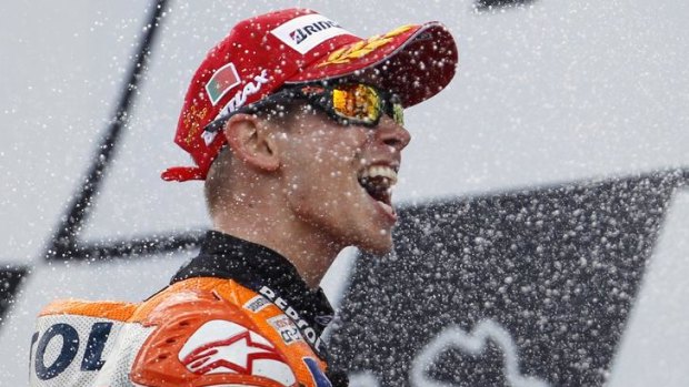 Casey Stoner celebrates winning the Portuguese Grand Prix.