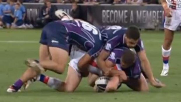 Heavy impact: Newcastle's Alex McKinnon as he suffers the neck injury.