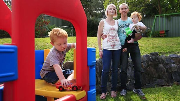 Scammed &#8230; Luke Bellamy with his wife Kristy, son Byron, 3, and daughter Evie, 2.
