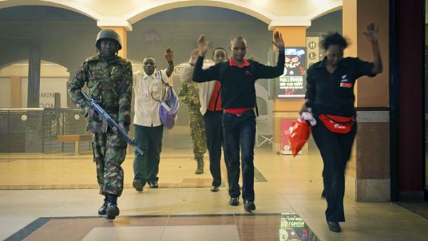 People leave the Kenyan mall last month after the al-Shabab attack.