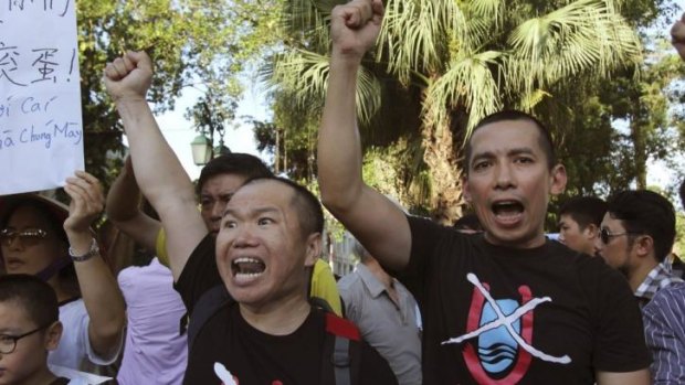 Vietnamese protesters chant anti-China slogans at a demonstration in Hanoi.