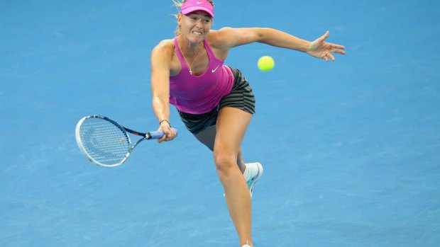 Maria Sharapova plays a shot against Kaia Kanepi during Thursday’s Brisbane International tennis tournament.