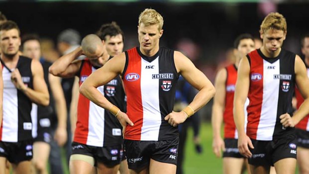 Disappointed: Saints skipper Nick Riewoldt leads his side off the field.