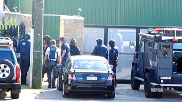 Police stormed the Coffin Cheaters headquarters in Beaconsfield today.