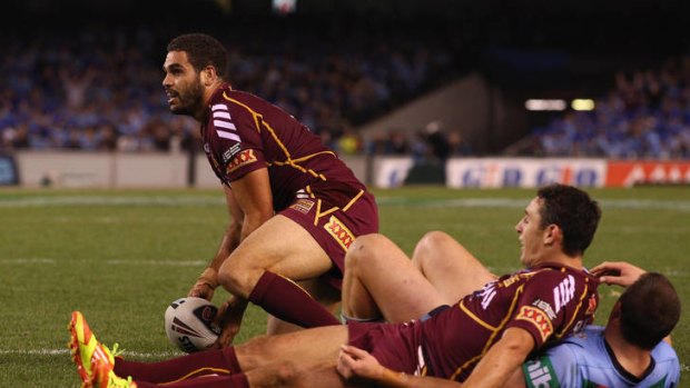Greg Inglis scores the controversial match-winner on Wednesday night.
