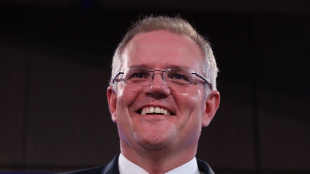 Social Services Minister Scott Morrison was all smiles at the National Press Club on Wednesday.