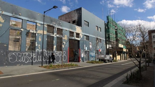 The site of Judith Neilson's proposed arts facility in Chippendale is currently occupied by a derelict warehouse.