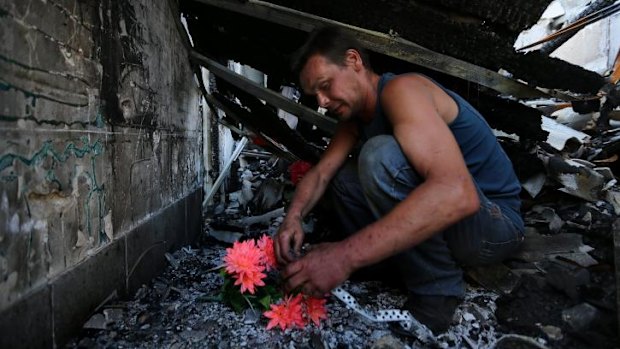 Dimitriy Gorozhaninov mourns for four members of his family, who died in a Ukrainian artillery barrage in Petrovskiy.