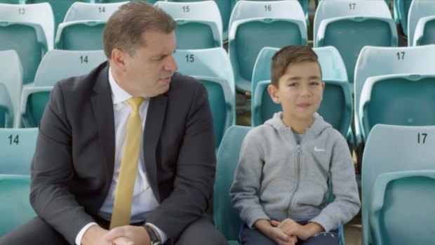 Yoshi with Socceroos coach Ange Postecoglou in the A-League video.