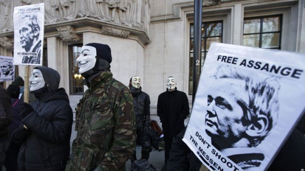 Julian Assange's supporters brave the cold outside the Supreme Court in London during his extradition hearing.