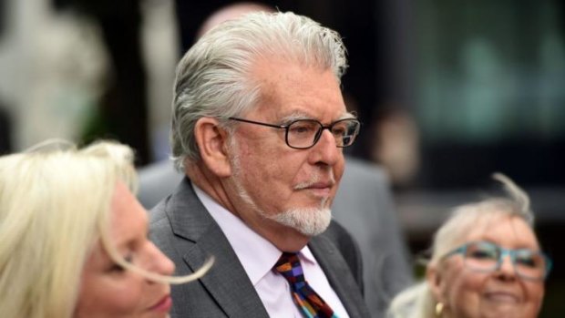 Rolf Harris arrives at court on Friday with his wife Alwen Hughes and daughter Bindi.