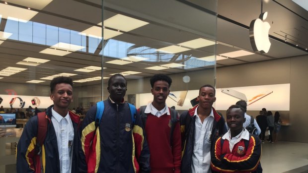 Students Petrie Alemu, Mabior Ater, Mihamed Semra, Ese Oseghale and Gereng Dere go to Apple at Highpoint Shopping Centre for the store's apology.