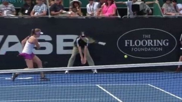 Close call: Jelena Ostapenko's racquet flies across the court.