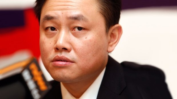 Pulling off a billion-dollar-plus deal from behind bars: Billionaire Huang Guangyu. 