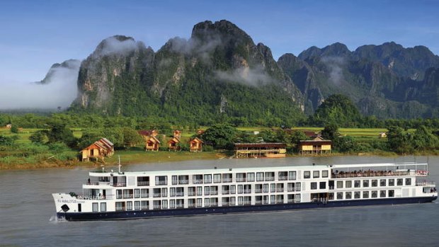 Tranquil ... RV AmaLotus on the Mekong River. A cruise on this vessel includes a butler service and a Luke Nguyen Signature Banquet.