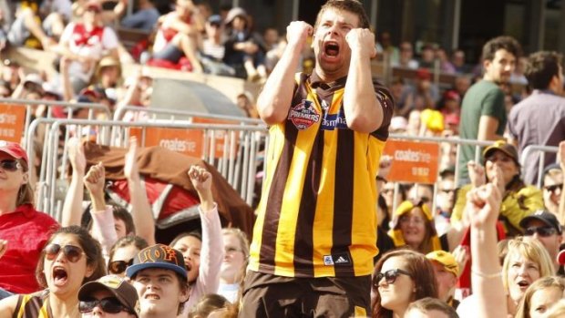 Jubilant Hawthorn fans at Federation Square on Saturday.