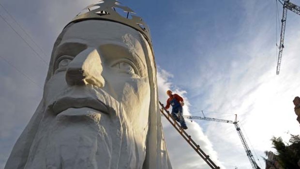 Spectacular... workers finish the head of Swiebodzin's Christ statue, due for completion next month.