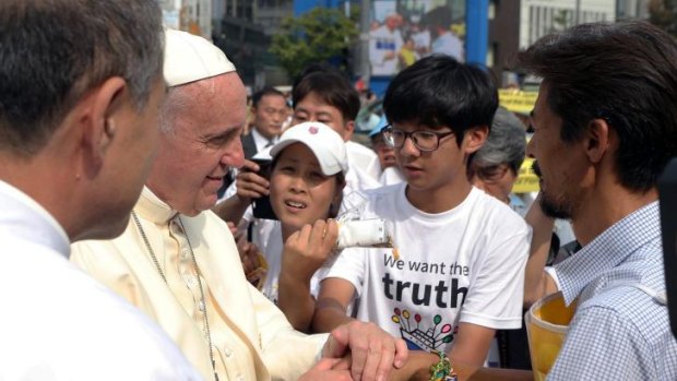 Pope Francis consoles family members of the victims of the sunken ferry Sewol.