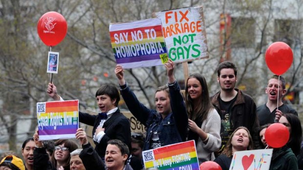 Supporters of same-sex marriage rally in Melbourne yesterday.