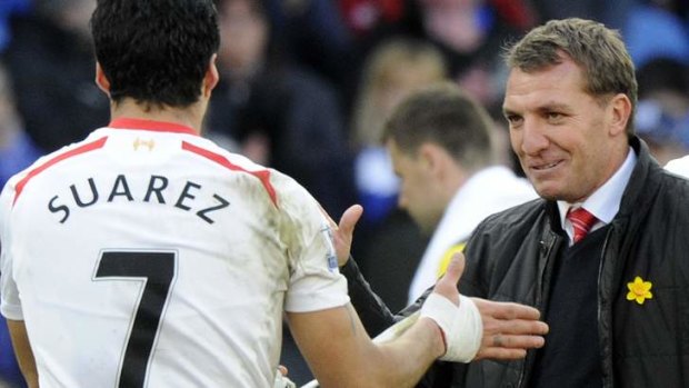 Liverpool's manager Brendan Rodgers and his star striker Luis Suarez.