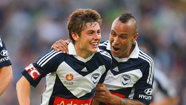 Marco Rojas and Archie Thompson react after Melbourne Victory scored against the Newcastle Jets on Friday.