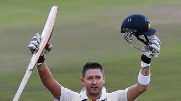 Australia's Michael Clarke celebrates his century during the first day of their first test match against South Africa in Cape Town.