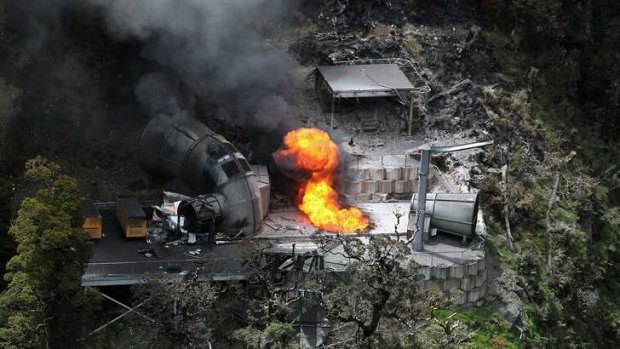 Safety checks ignored: Flames burn out of control from a ventilation shaft at the Pike River Mine on November 30, 2010.