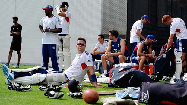 Dynamic England batsman Kevin Pietersen relaxes with teammates at a net session at the Gabba on Tuesday.