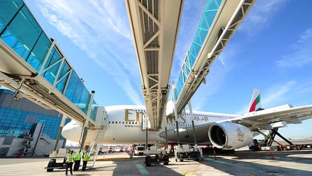 Emirates has begun operations from a $2.8 billion new concourse dedicated to Airbus' A380 superjumbos in Dubai.