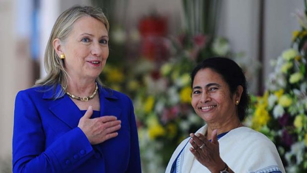 US Secretary of State Hillary Clinton, left, talks with India's West Bengal state Chief Minister Mamata Banerjee.