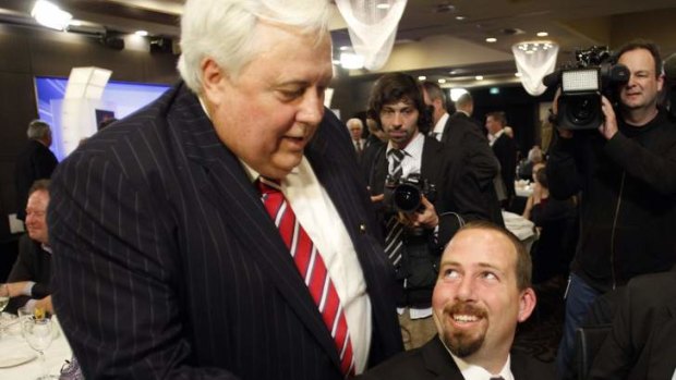Clive Palmer greets Motoring Enthusiast Party Senator-elect Ricky Muir, who is voting with the PUP on legislation.